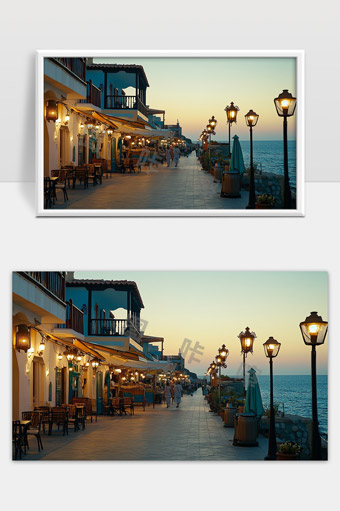 海边灯光映衬下的浪漫黄昏小镇街道景色