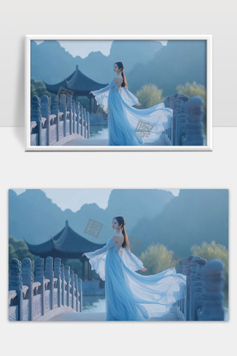 古风美人蓝色长裙立桥上山水风光优雅写真