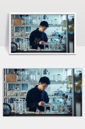 实验室中年轻科研人员专注进行科学实验研究