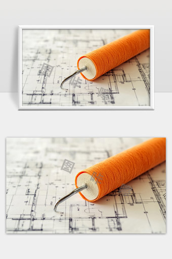 橘色线轴与建筑蓝图结合的创意设计图片